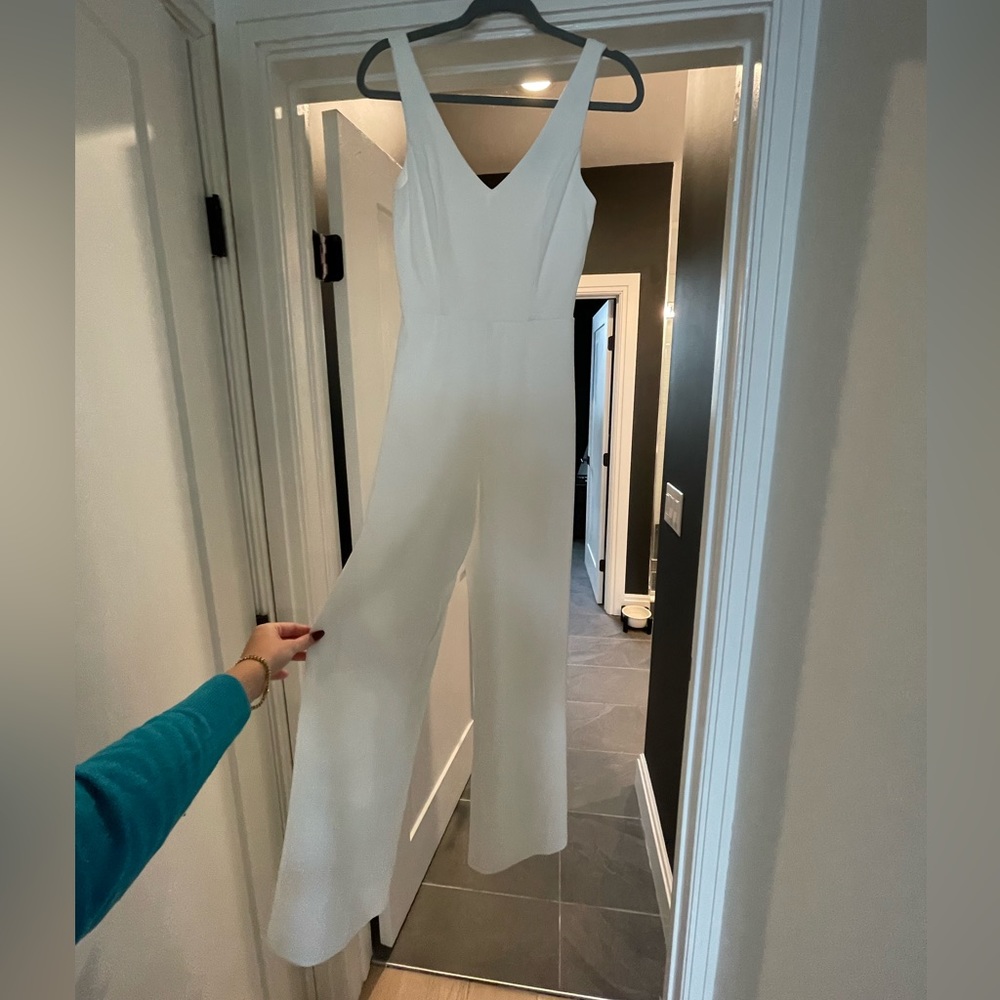 White sleeveless jumpsuit